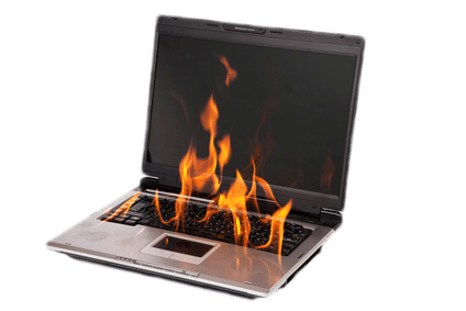 Laptop burning with fire on white background